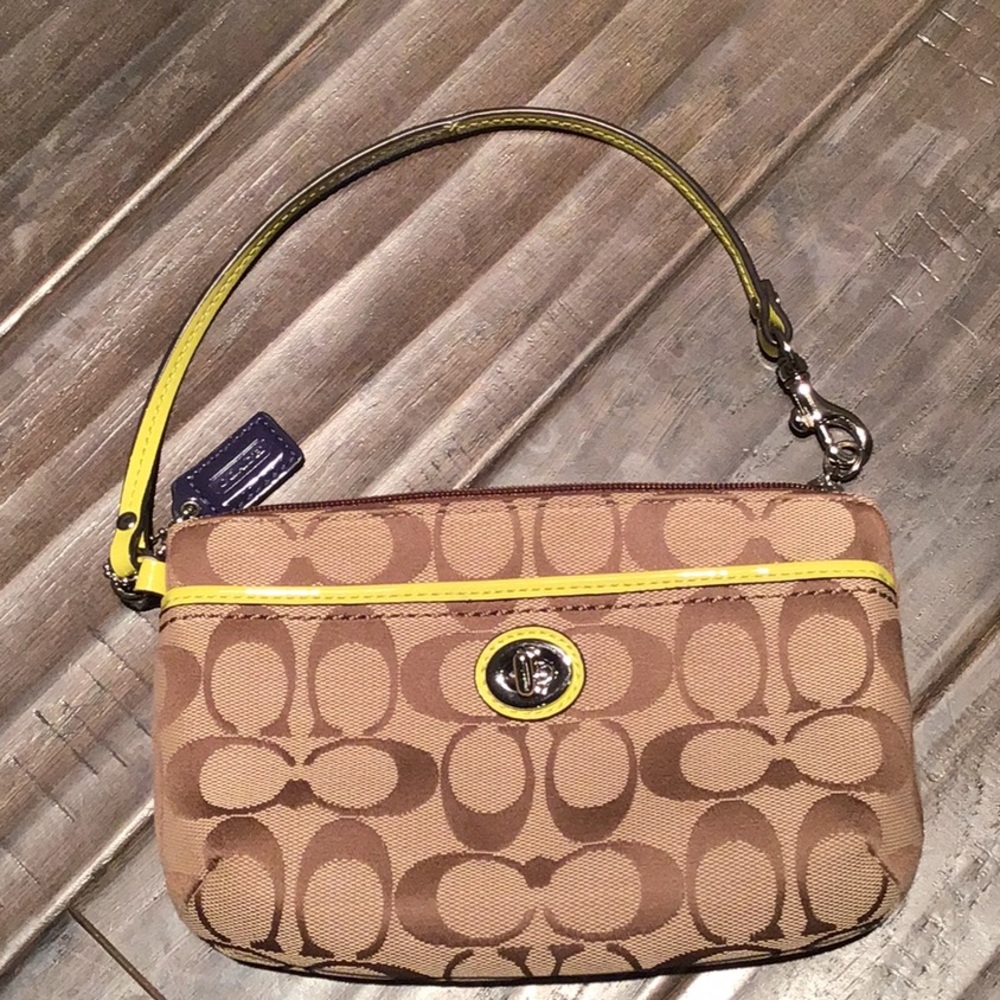 Coach signature print wristlet with patent trim